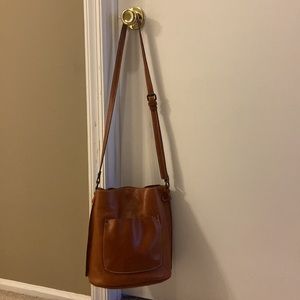 Patricia Nash handbag, bucket style, many inside pockets, embossed leather.